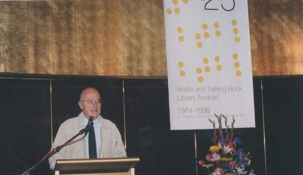 John Bryson at the podium