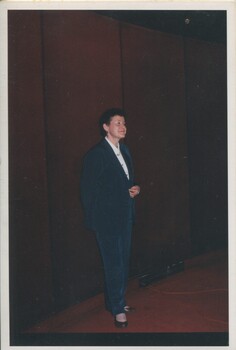 Rose Bluestein standing to the side of the hall