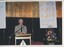 Stanley McGeagh reads from the podium