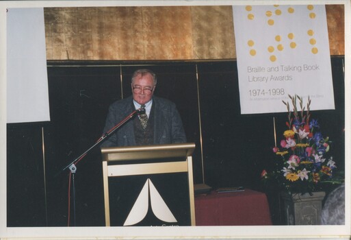Jeffrey Hodgson stands at the podium