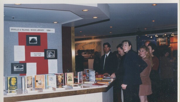 Display of LBA titles with George Zamanis and other staff looking on