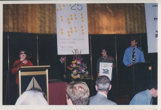 Judge for Braille Book of the Year presenting the award