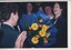 Rose Bluestein is presented with flowers, Elizabeth Woods, Meike Mellars, Robert De Graauw in background