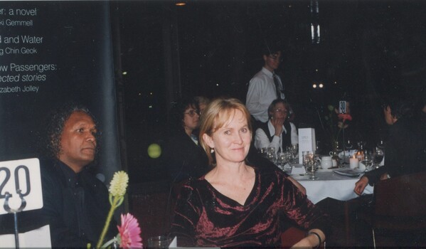 People at tables before the ceremony