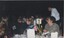 People at tables during the ceremony