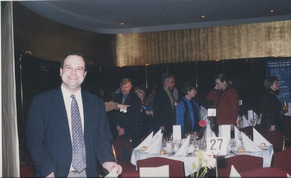 People leaving tables after the ceremony