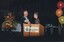 Robert Dessaix with unknown presenter receiving award