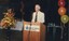 Stanley McGeagh reads from the podium
