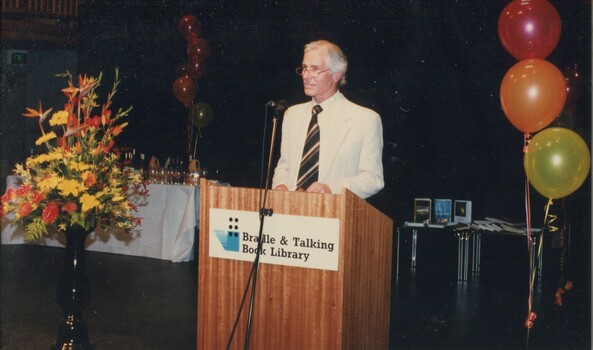 Stanley McGeagh reads from the podium