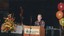 Unknown narrator presenting from the podium