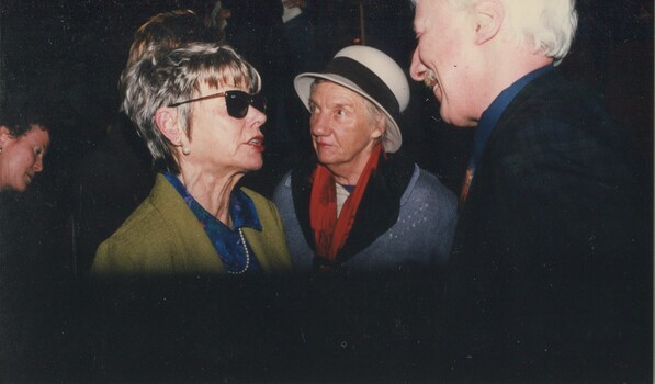 Anne Haddy speaking with Bruce Kerr, an unknown woman in the background