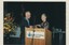 Robert Dessaix accepting his award from unknown female