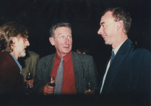 James Wright speaking to Don Bridges (left) and another guest