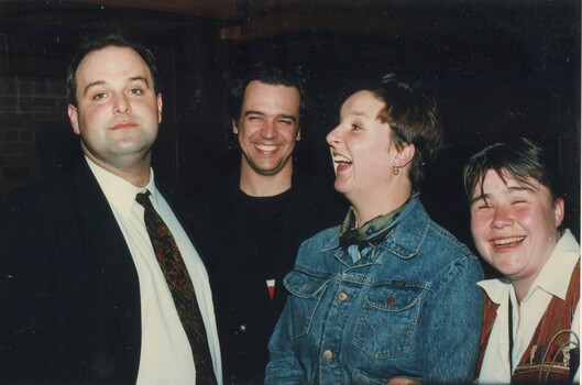Michael Rush and other staff members chatting at the after party