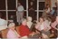 Elsie Black, May Maddern and others listen to Bryan Sitlington