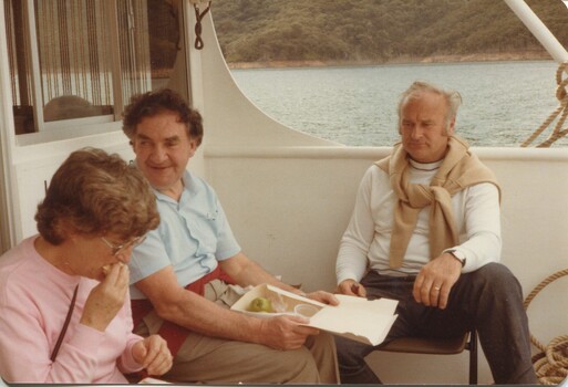 Peg and Bryan Sitlington on a boat with John Kunek