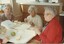 Unknown lady, Elsie Black and May Maddern enjoying packed lunch