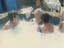 Relaxing in the hot tub - Maggie James and others