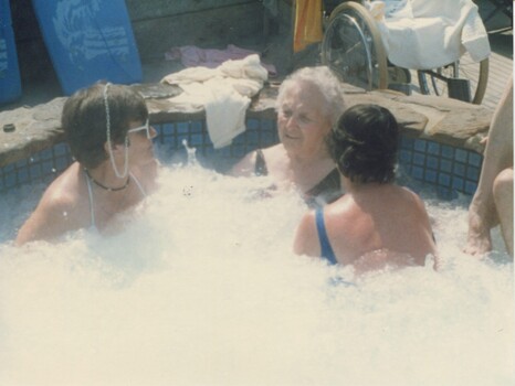 Relaxing in the hot tub - Maggie James and others