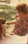 A woman feeds a German Shepherd at the luncheon