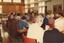 Group of people eating lunch in the Day Centre