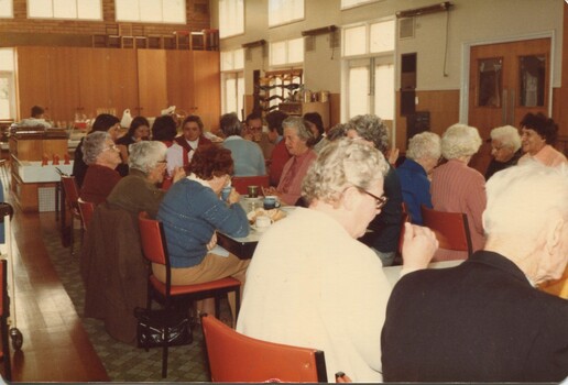 Group of people eating lunch in the Day Centre