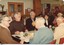 Group of people eating lunch in the Day Centre