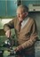 Man pours a kettle in his kitchen