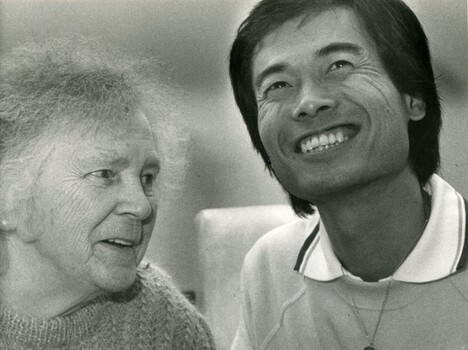 Elderly female speaking to a younger Japanese male