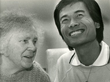 Elderly female speaking to a younger Japanese male