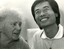 Elderly female speaking to a younger Japanese male