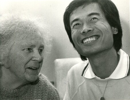 Elderly female speaking to a younger Japanese male
