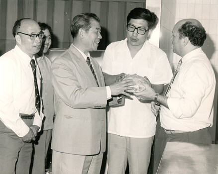 Chinese visitors speaking with Barry Furness