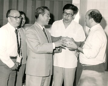 Chinese visitors speaking with Barry Furness