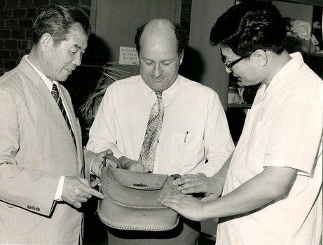 Chinese visitors speaking with Barry Furness