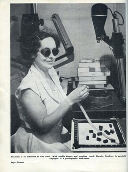 Dorothy Faulkiner working in a photographic studio dark room