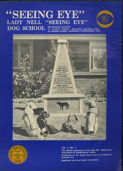 Four dogs in harness face stone monument to the first Lady Nell