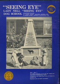 Four dogs in harness face stone monument to the first Lady Nell