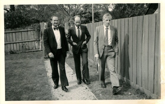 Dan McPhee, Lindsay McMillan and John Cook walking along a path with John Blanche and Diana Jones behind them