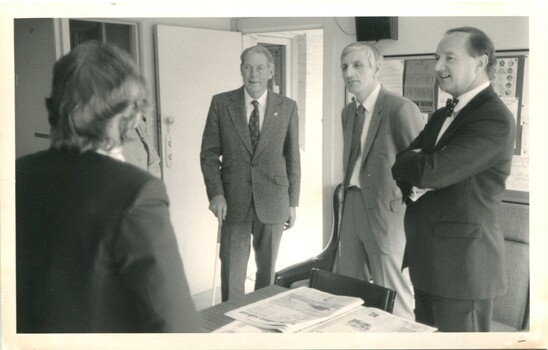 John Blanche, John Cook and Dan McPhee listen to a presentation