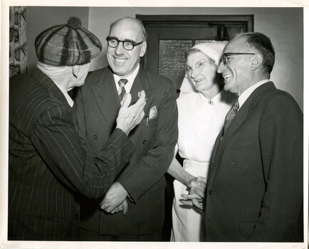 Hugh Robertson meets Duncan McDonald with Matron McLeod and Bruce Small looking on