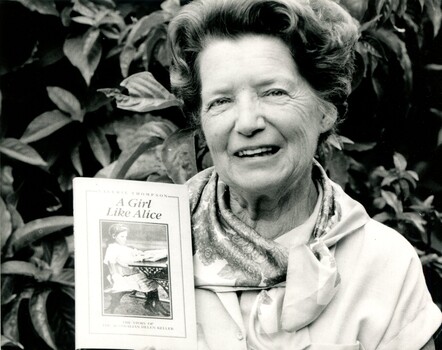 Author Valerie Thompson displays her book on Alice Betteridge