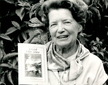 Author Valerie Thompson displays her book on Alice Betteridge