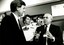 Mal Walden speaking with Ken whilst Jennifer Barnes looks on