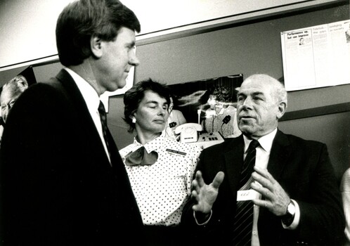 Mal Walden speaking with Ken whilst Jennifer Barnes looks on