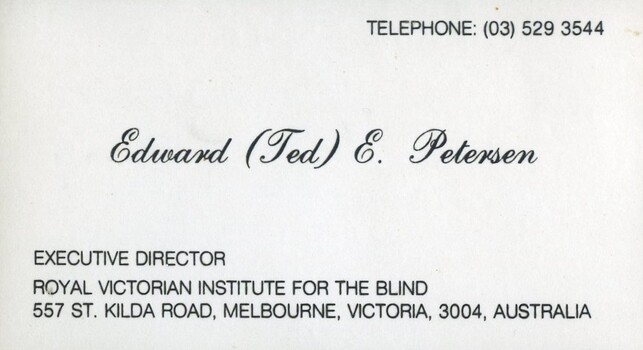 White business card with black writing