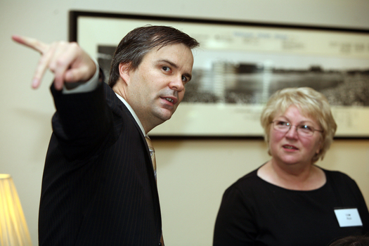 Chris Edwards with guest at ceremony