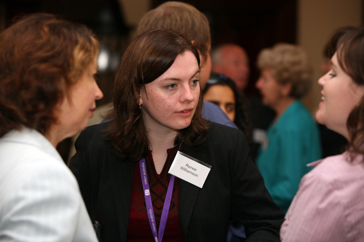 Renee Williamson speaking with other guests