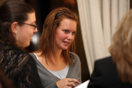 Sarah Sheehan speaking with other guests