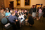 A crowded room before the ceremony